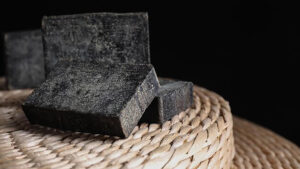 natural-tar-soap-wicker-pouf-closeup_495423-32736